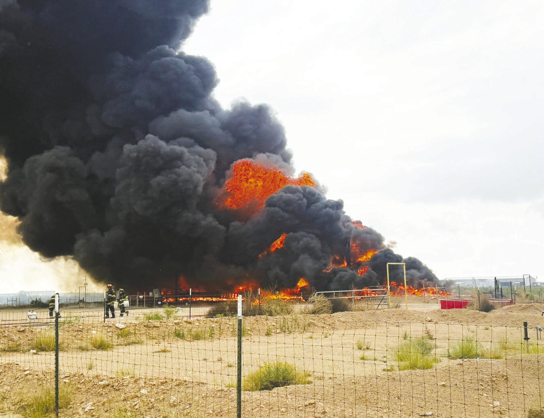 The Greenwood Volunteer Fire Department responded to a heater treater explosion at an oilfield site on County Road 1130 on Wednesday, May 27 (above). One week earlier, Greenwood crews also assisted with a tank battery fire on FM 1788 (below) that burned for about six hours after reportedly being sparked by a lightning strike.