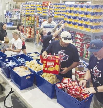 Outlaws donate equipment to middle school athletics, strengthening community ties