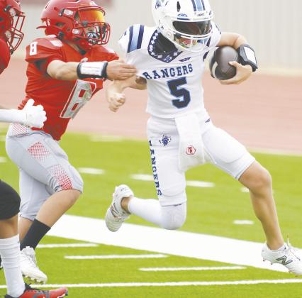 Brock Hughes scores a Greenwood touchdown.
