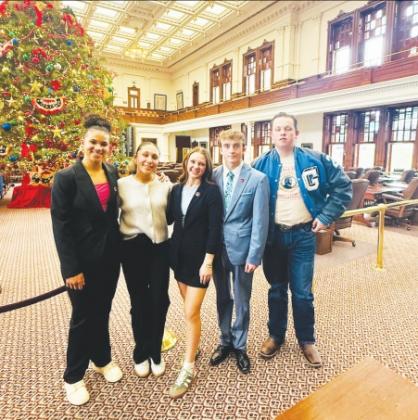 Greenwood High School debate students pictured inside the Texas State Capitol