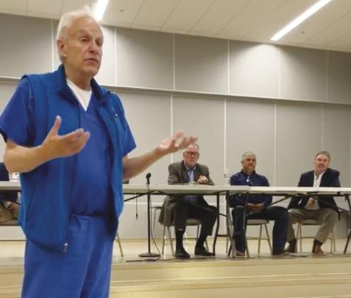MCUD President Dr. Shelton Viney talks to Greenwood residents during a town hall meeting on Tuesday about the proposed bond for a district wide water system.
