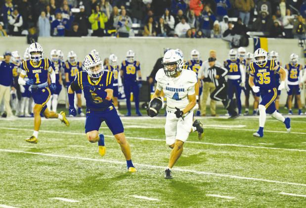 Greenwood’s Dylan Payton races for a touchdown in the Class 4A DII Regional Finals against Brock at Abilene Christian University to tie the game at 14-14.