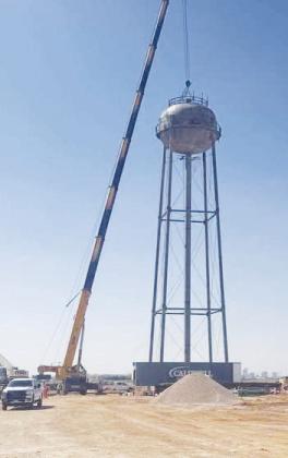 A water tower was installed this week at the Midland County Utility District’s new water treatment facility next to the new Midland County jail in Greenwood on SCR 1140. The tower holds 100,000 gallons of water. The facility also includes two 2-million-gallon tanks that the Greenwood Ranger featured in last week’s edition. MCUD will provide water to the new jail and the new Greenwood ISD elementary and intermediate schools expected to open in August.