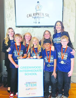 Cal Ripkin Sr. Foundation STEM team: Sponsor Elizabeth Kivin, Sonny Conner, Kenzlee Everett, Brantlee Tinkler, Benito Saenz III, Eva Wilkinson, Ty Moore, Greenwood Intermediate Principal Heather Bennett.