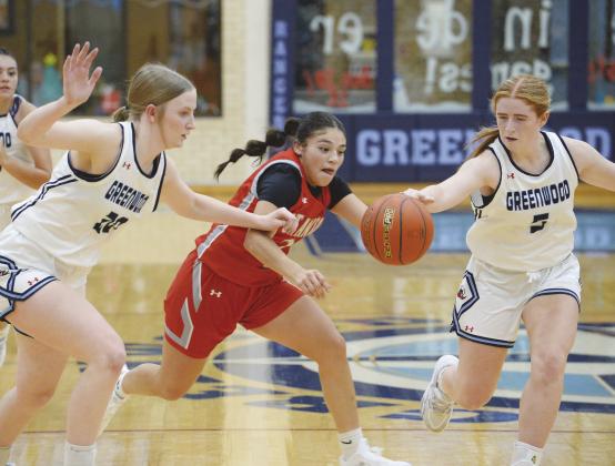 Greenwood’s Caili McDonald and Emily Jones pick up the defensive pressure and help the Rangerettes to a 50-46 victory over Stanton.