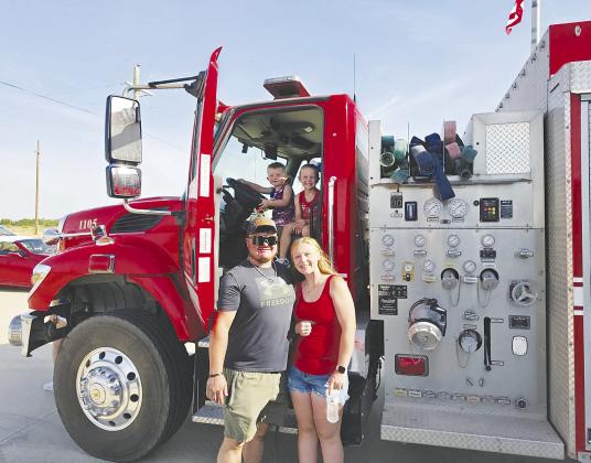 The Greenwood Volunteer Fire Department served hundreds of people during its annual Fourth of July pancake breakfast, a tradition held each year to thank the community for its support. Children climbed aboard the fire trucks, leaving behind a few sticky syrup fingerprints, before firefighters responded to 24 fire calls from July 4 into the early hours of Sunday. More picture on page five.