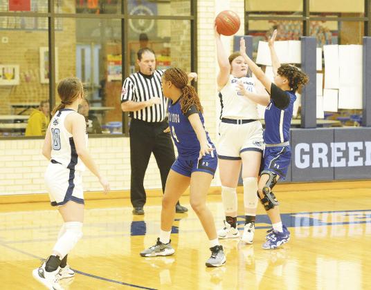 Greenwood’s Kiki Jackson drop a dime to a cutting teammate for a layup during non-district action against Palo Duro earlier this season.