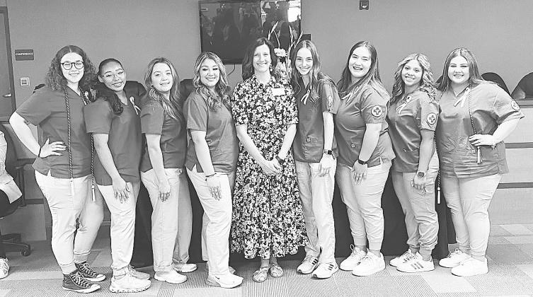 These Greenwood ISD students earned the honor of being the first class at GISD to complete the CNA program.