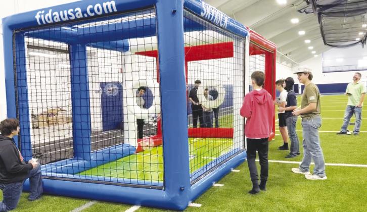 Greenwood High School and Middle School students play drone soccer. A group of middle school students will travel to Palm Springs, California, next month to compete.