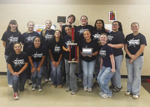 Greenwood High School band students earned several awards at the West Texas Auxiliary Competition in Lubbock. The GHS drumline placed second in Class 4A, while the color guard won first place. Kynzlie Hillis was named Outstanding Color Guard Soloist, and Weston Cummings and Rylee Vaughn earned Outstanding Color Guard Ensemble honors for the fourth consecutive year.