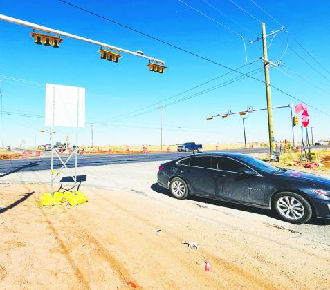 The intersection at FM 307 and CR 1110, where a long-awaited traffic light remains inactive.