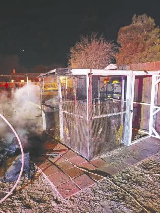 Backyard fire quickly contained by volunteer firefighters