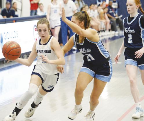 Greenwood guard Grace Franks blows past a Lady Wolves defender during the Class 4A Bi-District playoff game against No. 23 Canyon West Plains on Monday at Lubbock Cooper Liberty High School.