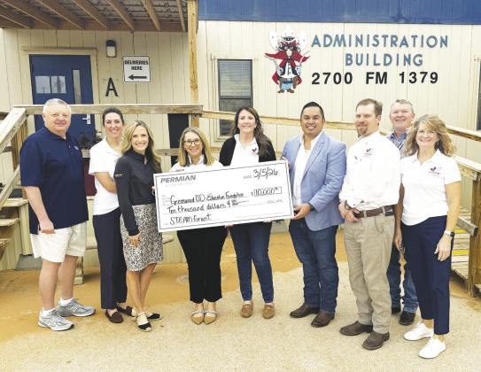 Representatives with Permian Resources presented members of the Greenwood ISD Education Foundation board and district leaders with a $10,000 donation to support classroom grants for teachers expanding STEAM learning.
