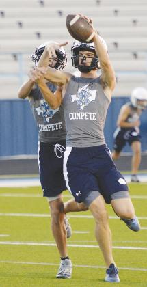 Greenwood defensive backs work on breaking up or intercepting passes during two-a-day practices this week. The Rangers have one more full week of practice before heading to Big Spring for the first scrimmage of the season. See story page 10.