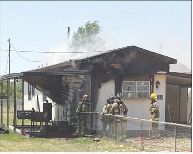 Greenwood boys jump into action during house fire, help evacuate woman & dogs