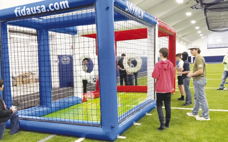 Greenwood High School and Middle School students play drone soccer. A group of middle school students will travel to Palm Springs, California, next month to compete.