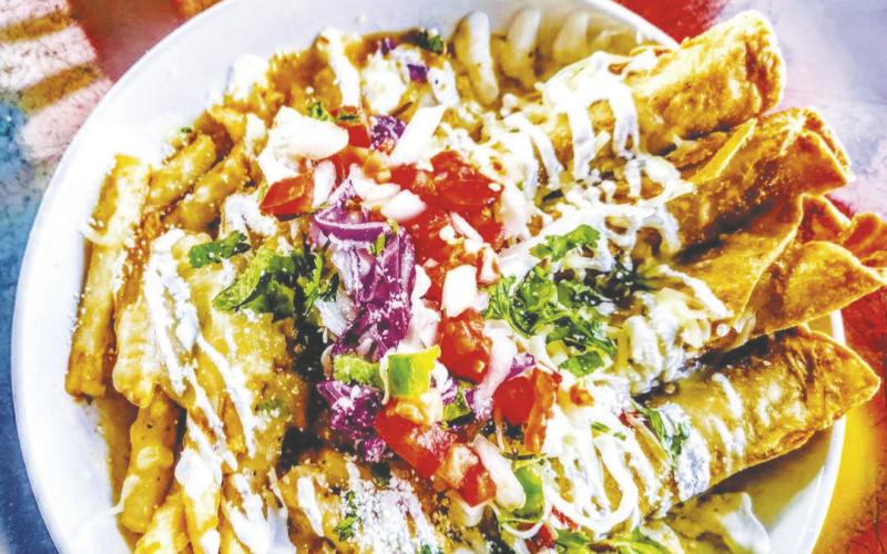Crispy chicken flautas topped with tomato consommé and Oaxaca cheese were served as a special this week at Chill N Vibe in Greenwood, located in the former Ranger Station building on FM 307.