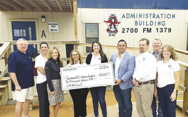 Representatives with Permian Resources presented members of the Greenwood ISD Education Foundation board and district leaders with a $10,000 donation to support classroom grants for teachers expanding STEAM learning.