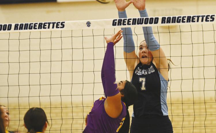 Lexi Stewart with the block against the Pecos Lady Eagles in district play.