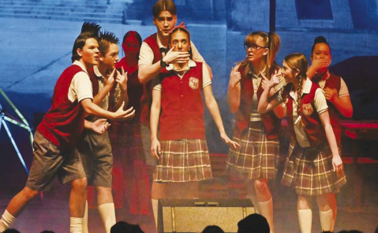 A scene from Greenwood High School Theatre Department’s production of Matilda Jr., performed earlier in December. The students put on a three-day public run of the musical, with help from elementary and junior high students in one of the scenes. The department said the show was a huge success and credited the hard work of everyone on stage and behind the scenes.