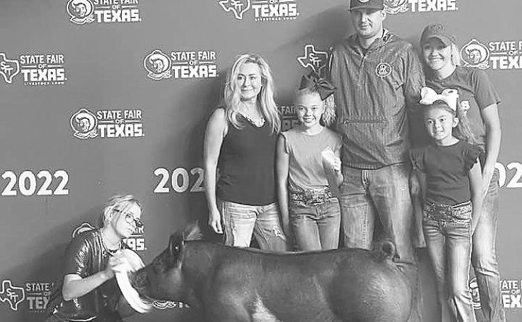 Greenwood 5th grader Kyndi Smith showed her Crossbred barrow, Rodeo Rob, at the State Fair of Texas. She placed 6th and sold him in the Jr Livestock Auction.