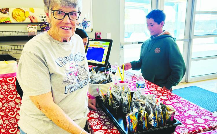 Sandra Smith smiles behind the counter at the middle school cafeteria’s Snack Shack, where she continues to serve students each day. She has worked in GISD cafeterias for 38 years, known for her steady presence and love for the kids.