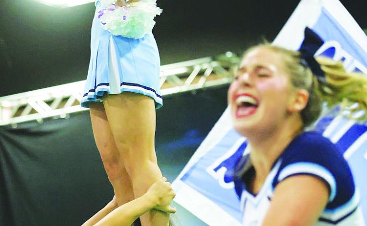 The Greenwood High School cheer team performs at the UIL State Spirit Competition in Fort Worth on Jan. 15. They made it to the finals and finished 6th in the state in the 4A Division II.