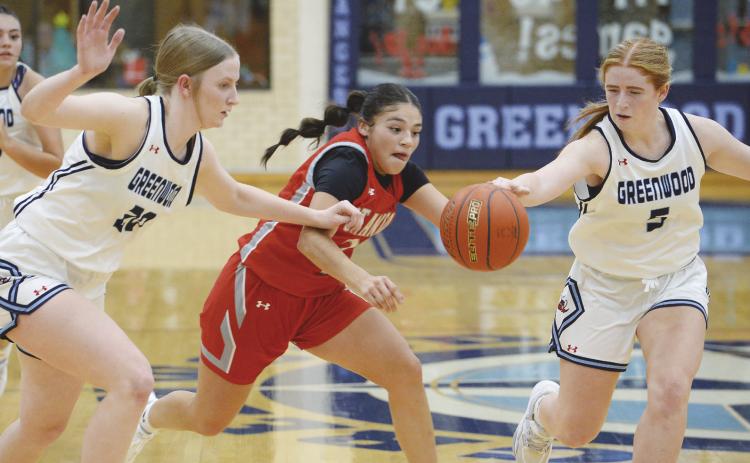 Greenwood’s Caili McDonald and Emily Jones pick up the defensive pressure and help the Rangerettes to a 50-46 victory over Stanton.