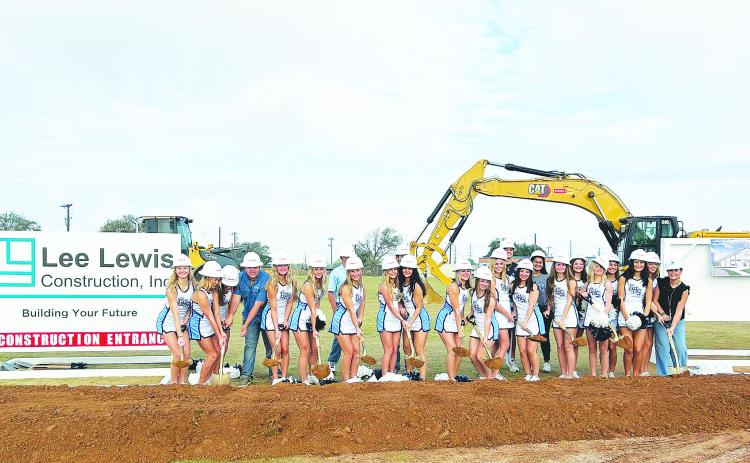 Greenwood’s cheerleaders helped with ground breaking ceremonies on the new 74,000 square-foot Multi Purpose Facility that will serve all of Greenwood. The project, funded by part of the bond that passed earlier this year, will include a 75-yard turf field, bleachers, an indoor track, training room and more. It’s estimated to cost $11 million. by Lee Lewis Construction