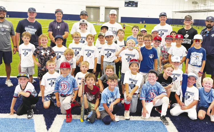 First- through fourth-grade boys are all smiles