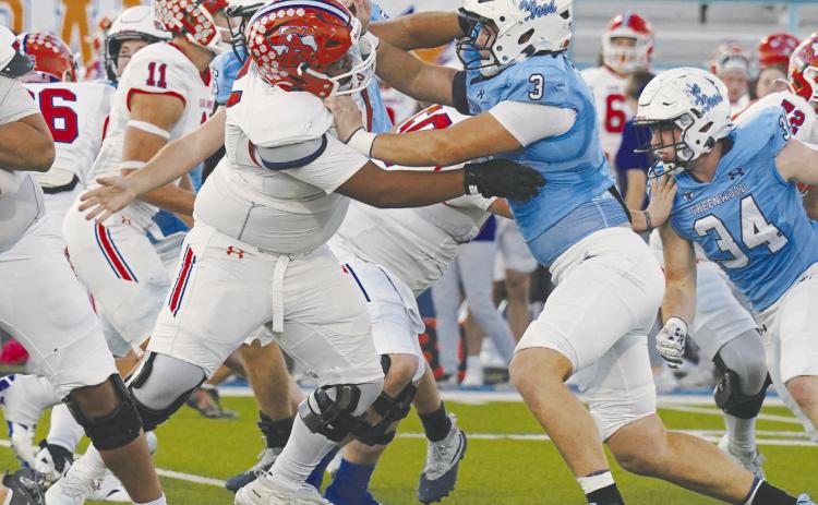 Greenwood’s defense played a sensational game holding Central’s high powered offense to just three touchdowns, the Bobcats lowest of the season. photo by Graycee Underhill