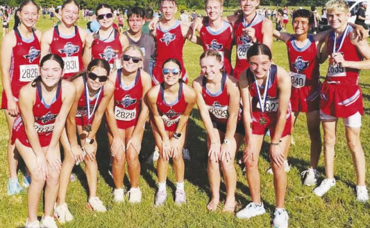 The Greenwood Rangerettes cross country team kicked off the 2025 season in style, bringing home first place at the Temple Invitational on Friday at Lions Park. by Scott Robinson