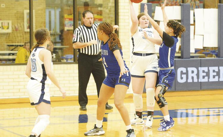Greenwood’s Kiki Jackson drop a dime to a cutting teammate for a layup during non-district action against Palo Duro earlier this season.