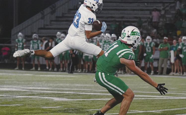 Greenwood’s Casey Vacero with the acrobatic catch against the Wall Hawks last week. photo by Grace Underhill