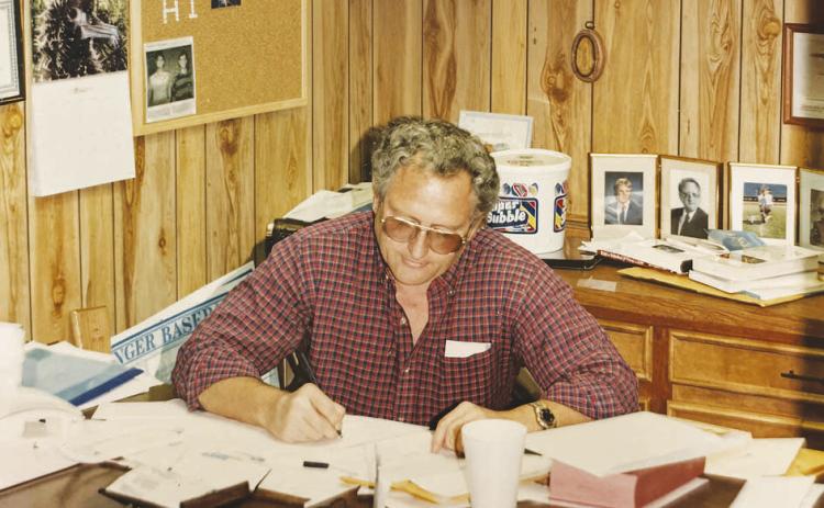Pastor Waymon Swopes works at his desk during his years as senior pastor of Greenwood Baptist Church. He served as pastor from 1987 until his retirement in 2010.