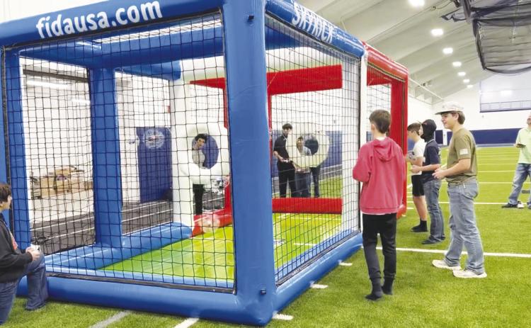 Greenwood High School and Middle School students play drone soccer. A group of middle school students will travel to Palm Springs, California, next month to compete.