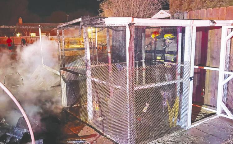 Backyard fire quickly contained by volunteer firefighters