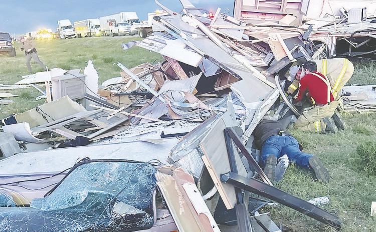 Martin County first responders search for victims following a major three vehicle wreck in Martin County on I-20 Tuesday evening. See story this page.