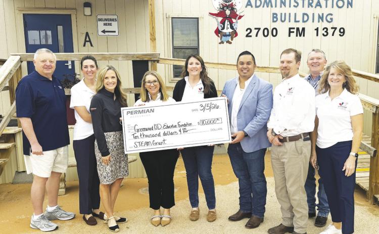 Representatives with Permian Resources presented members of the Greenwood ISD Education Foundation board and district leaders with a $10,000 donation to support classroom grants for teachers expanding STEAM learning.