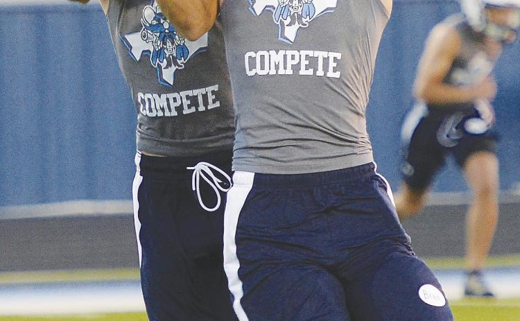 Greenwood defensive backs work on breaking up or intercepting passes during two-a-day practices this week. The Rangers have one more full week of practice before heading to Big Spring for the first scrimmage of the season. See story page 10.